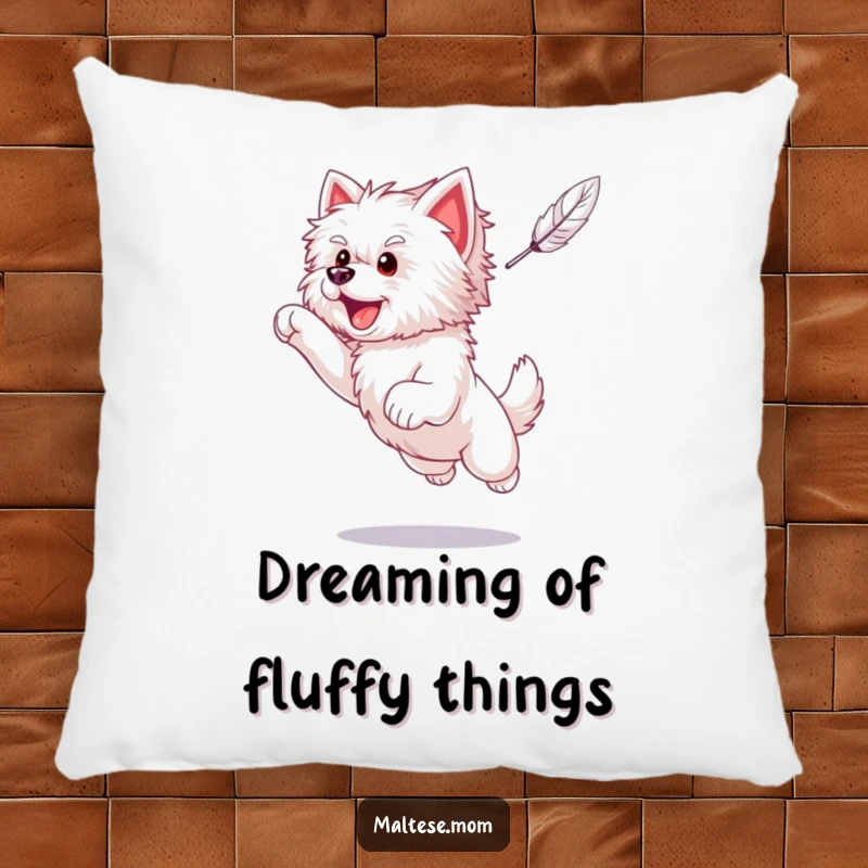 Funny Maltese puppy caught in a joyful leap, reaching for a feather, on a soft and decorative pillow.