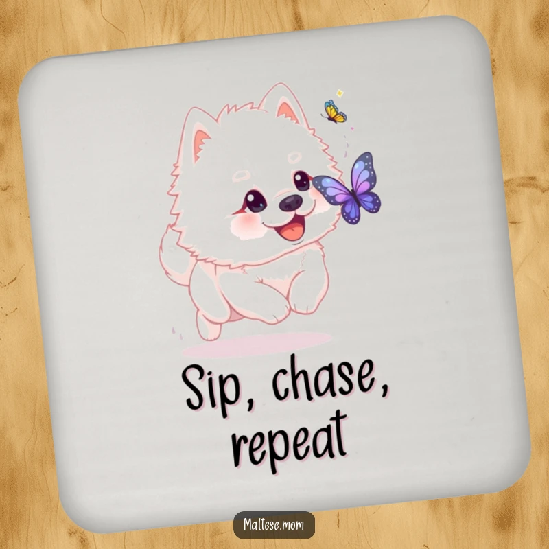 Funny fluffy white dog with playful glint chasing shimmering butterfly on drink coaster. Playful table accessory, ideal funny gift.