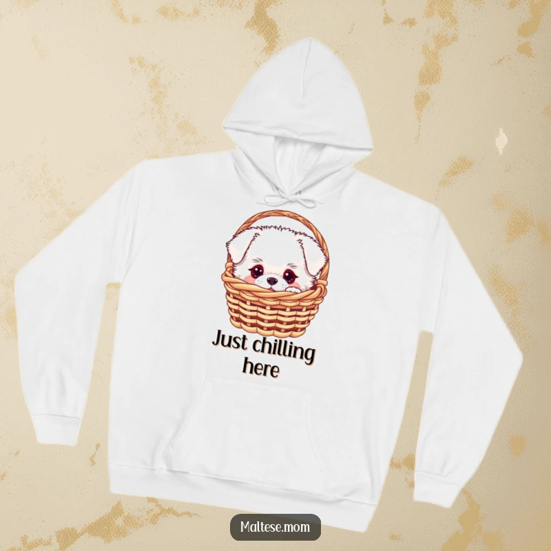 Funny white fluffy dog peeking from a miniature basket, printed on a soft, warm hoodie, ideal for a funny gift.