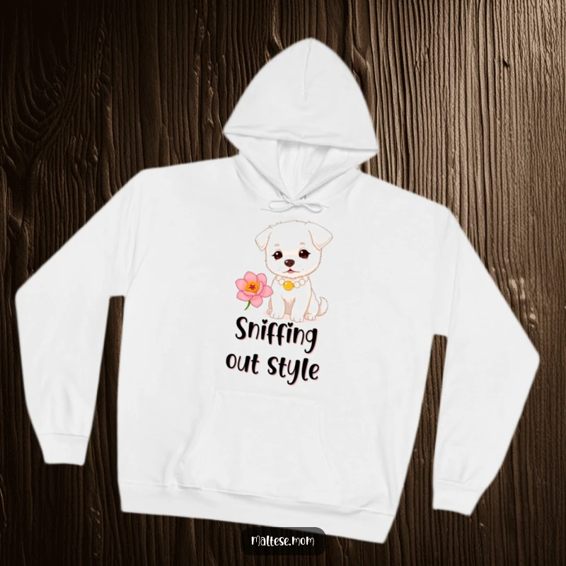 Funny small white dog with a pearl necklace sniffing a flower on a hoodie. Cozy elegant pet wear, perfect funny gift.