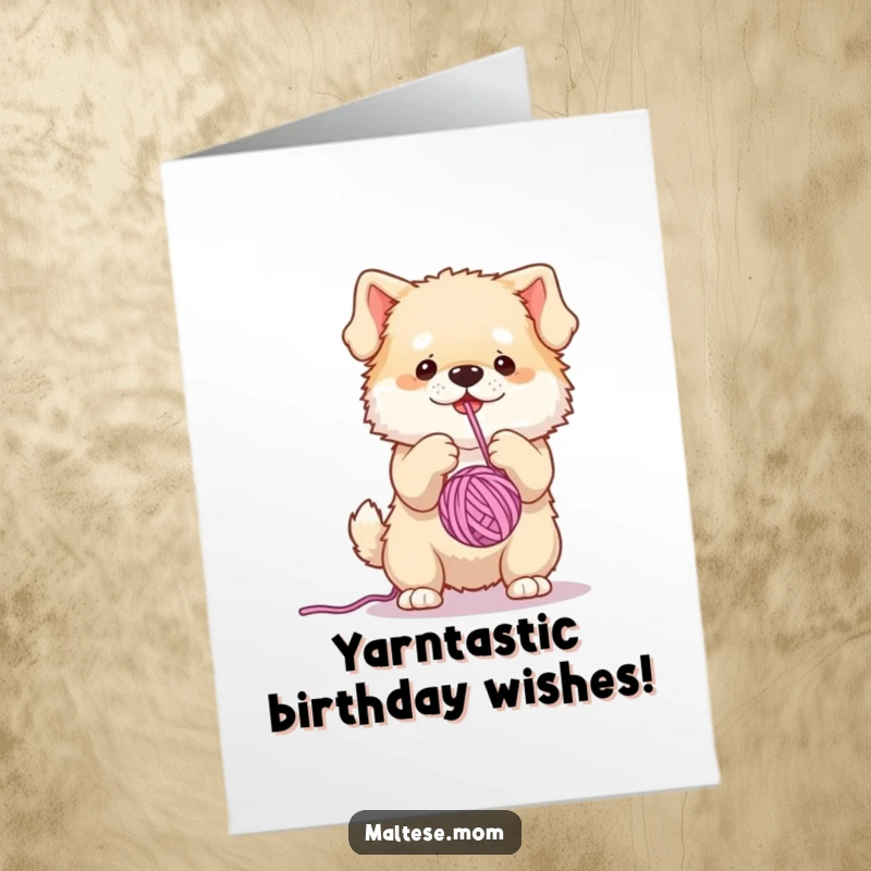 Funny Free Printable Birthday Card: Fluffy dog playfully batting at a dangly yarn ball, celebrating with joy.