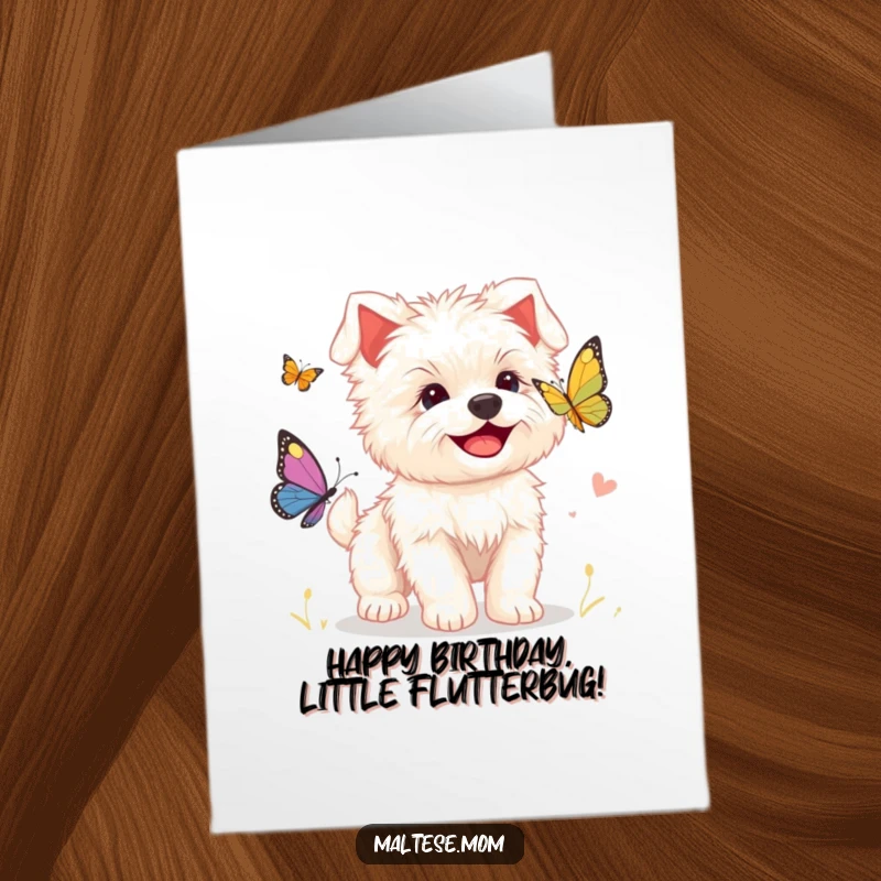 Funny Free Printable Birthday Card: Cute Maltese puppy with a big smile joyfully chasing a colorful butterfly.