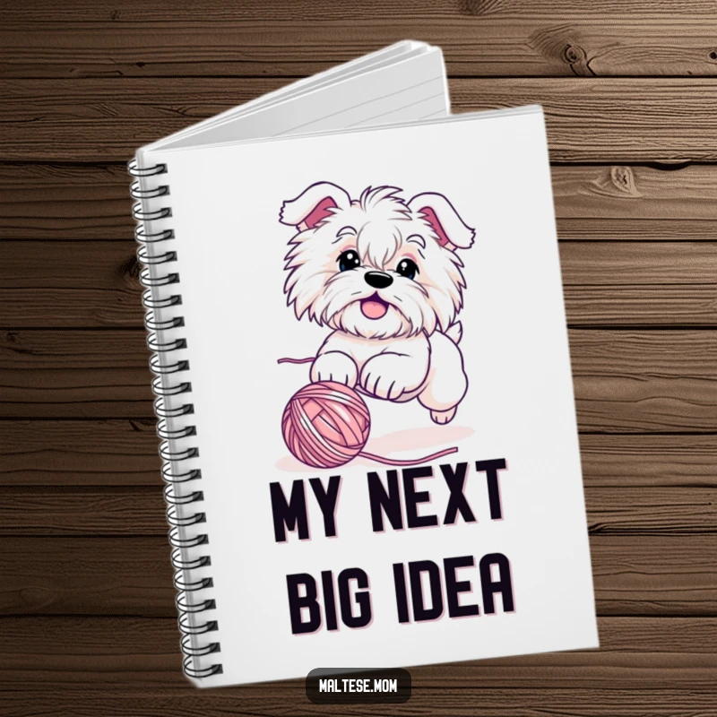 Funny Maltese dog notebook with a cute character energetically pursuing a rolling ball of yarn, ideal for personal notes and creative writing.