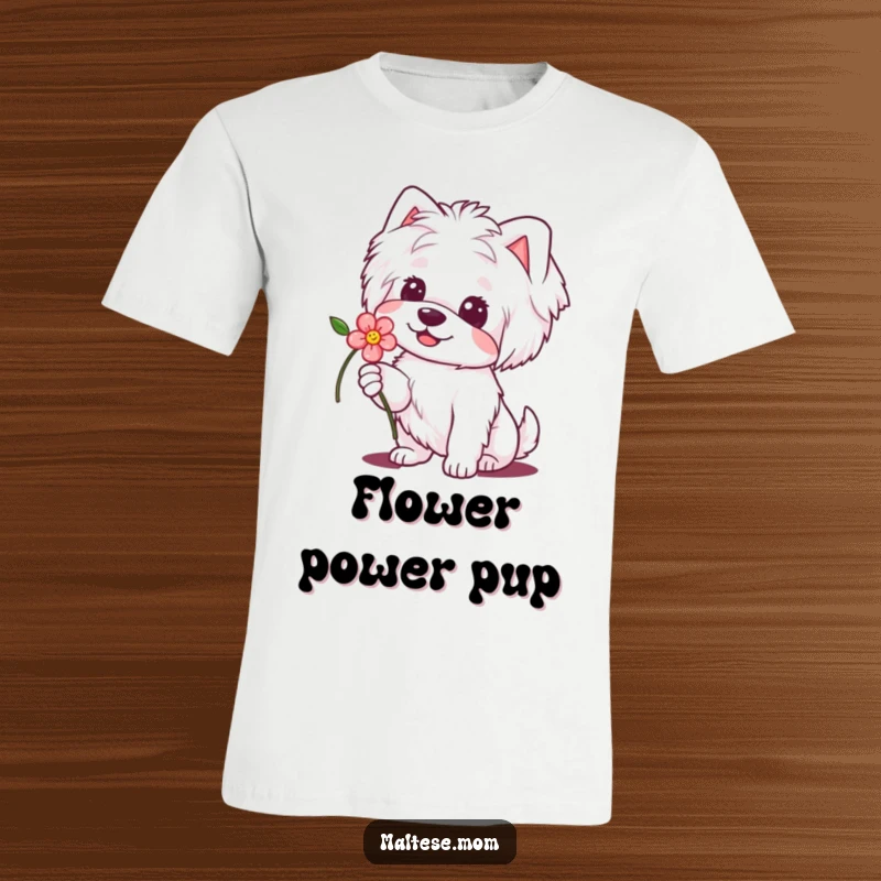 Funny Maltese Dog T-Shirt: Adorable dog with a sweet smile presents a delicate flower, conveying heartwarming humor.