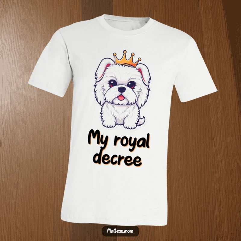 Funny t-shirt depicting a fluffy Maltese dog wearing a tiny crown, presenting a picture of adorable, dignified royalty.
