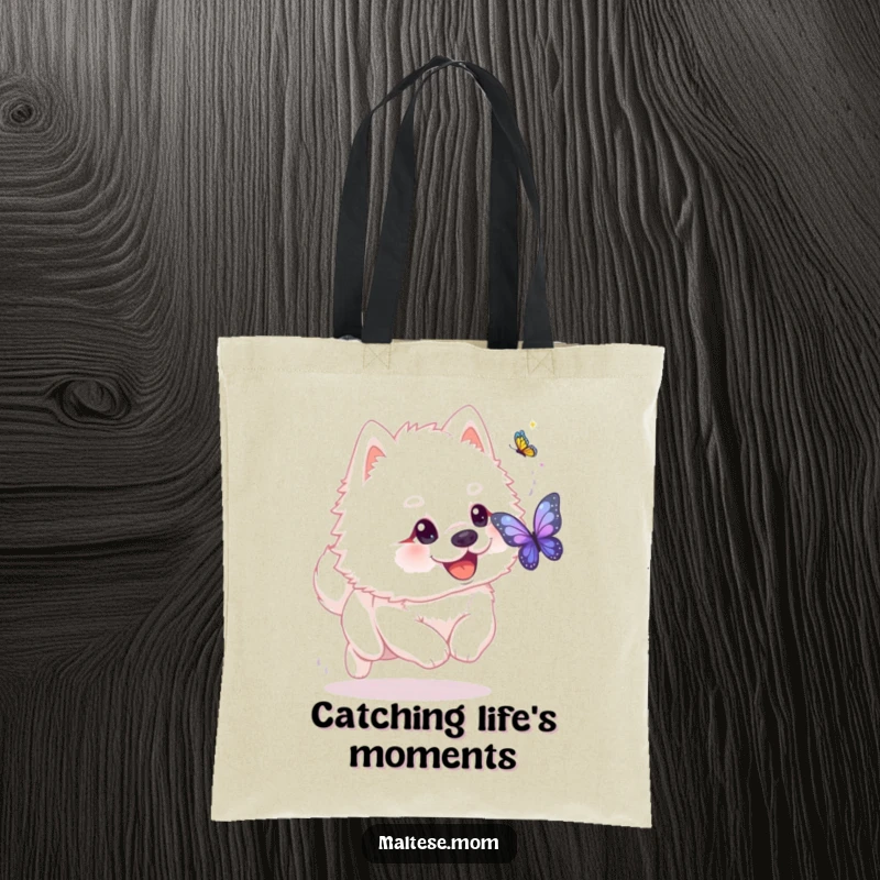 Funny fluffy white dog with playful glint chasing shimmering butterfly on tote bag. Playful pet accessory, ideal funny gift.